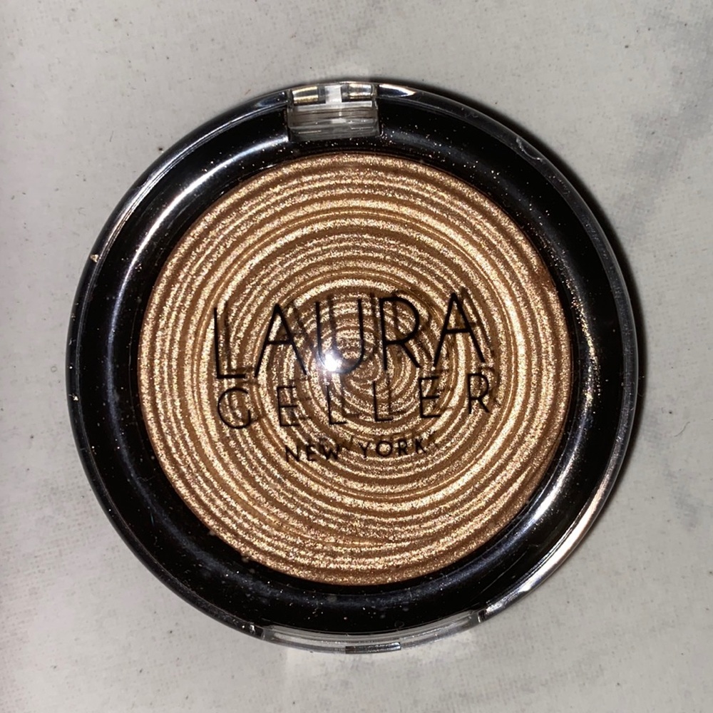 laura geller swirl highlighter